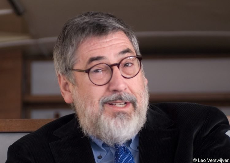 How did John Landis build his fortune