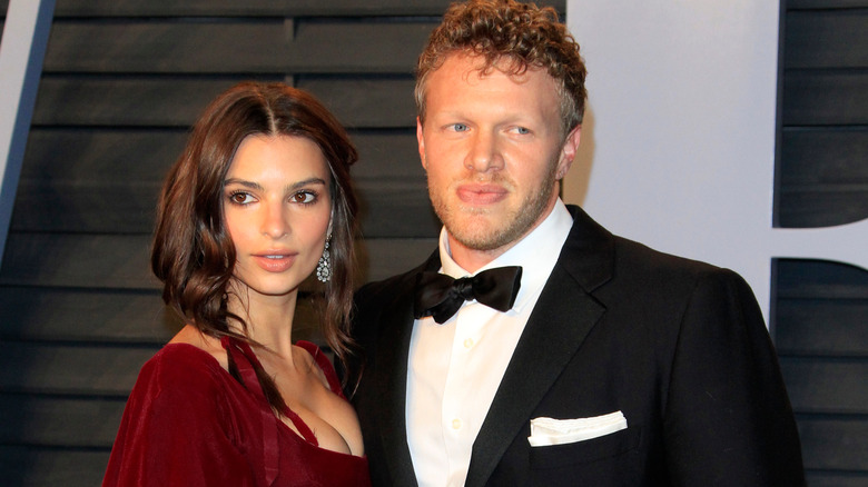 How does his net worth compare to Emily Ratajkowski's?
